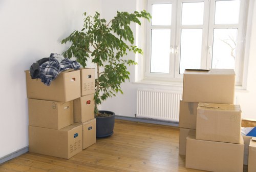 Household furniture and boxes being loaded for a Worcester Park move