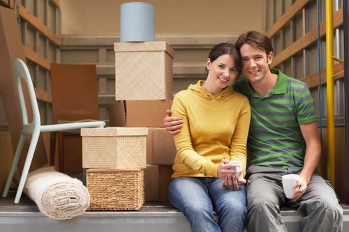 Packed boxes and furniture ready for collection by Worcester Park movers