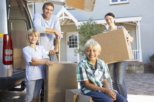 Furniture collection service loading sofas, beds, and office items for Worcester Park customers