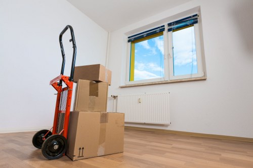 Furniture being carefully moved from a Worcester Park property