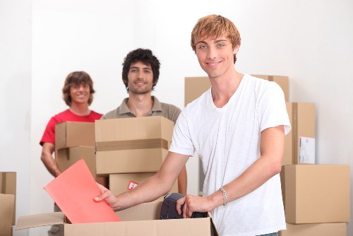 Packed boxes and furniture prepared for house removals