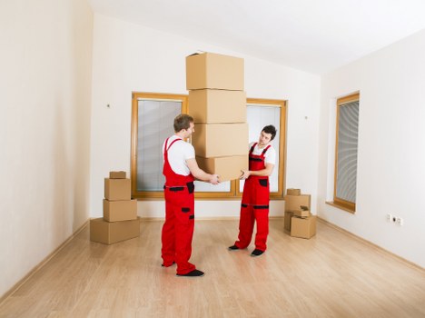 Residential moving service in Worcester Park with boxes and furniture