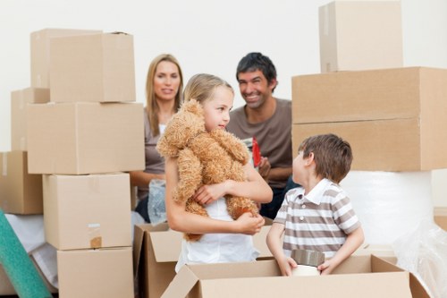 Local removals team handling furniture in Worcester Park